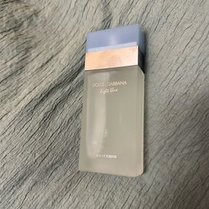 Mini DOLCE& GABBANA light blue perfume. Maybe used once just to smell. Brand new